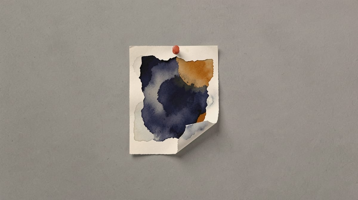 Photograph pinned to wall with edges fading and peeling away, center still visible before curling off completely.